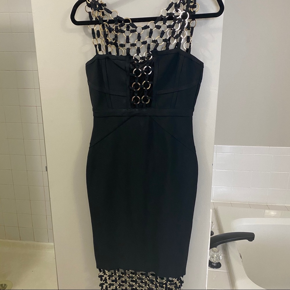 Black dress with gold embezzlement